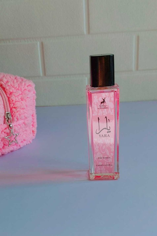 عطر یارا Maison Alhambra صورتی ۳۵ میلیلیتری مخصوص بانوان با رایحه شیرین و وانیلی، طراحی شیشهای شفاف و درپوش مشکی شیک